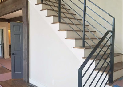 Horizontal spindle black railing with clean modern lines